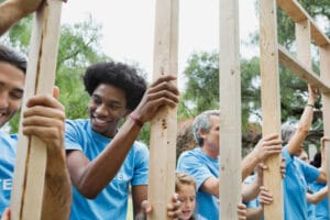 Volunteers Framing a House