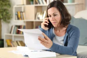 Lady reading letter form the IRS